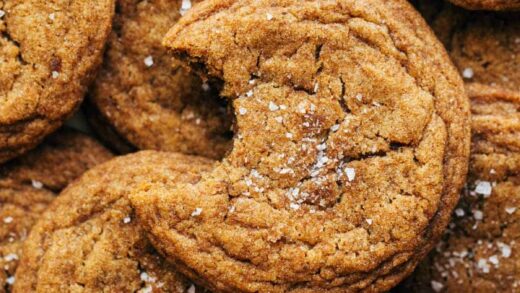 close up on a pumpkin cookie with a bite taken out