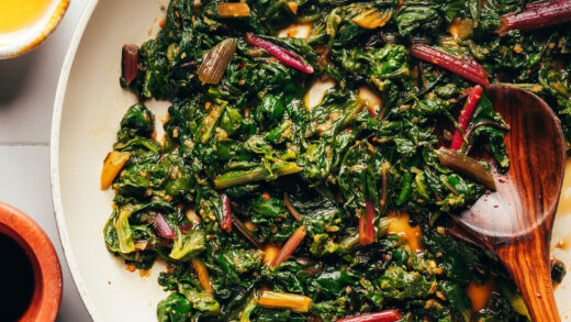 Skillet of sautéed swiss chard with garlic and sesame