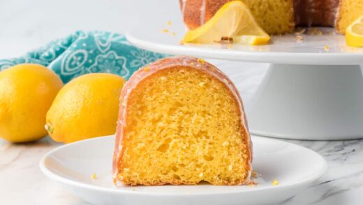 A piece of Easy Lemon Cake with lemons