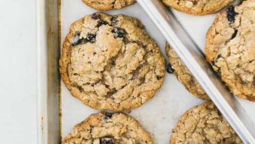 oatmeal raisin cookies on baking sheet