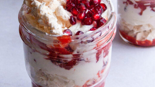 45 degree angle shot of pomegranate meringue mason jars