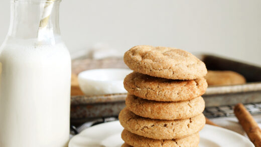 stack of snickerdoodle cookies on white plate