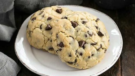 2 levain chocolate chip cookies on a round white plate