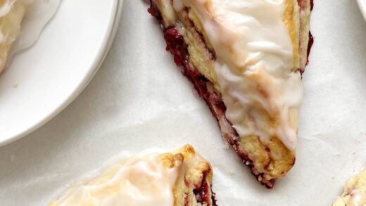 raspberry scones on parchment paper