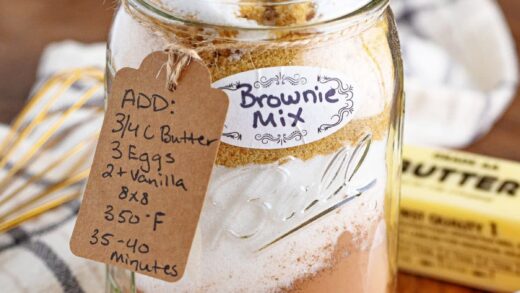 A jar of Homemade Brownie Mix with a tag and label.